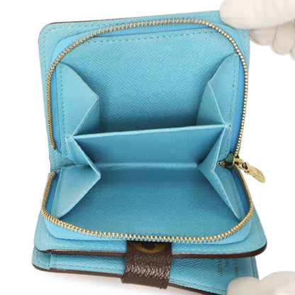 Exclusive Louis Vuitton Monogram Groom Compact Zip Wallet — Lifestyle View