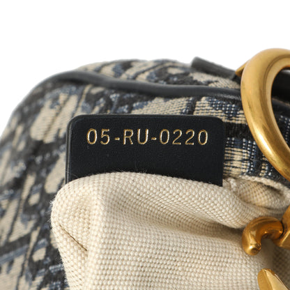 Exclusive Christian Dior Oblique Mini Saddle Bag — Lifestyle View
