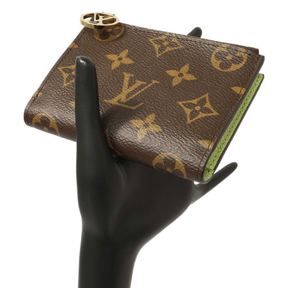 Exclusive Louis Vuitton Vert Noto Monogram Lisa Wallet — Lifestyle View