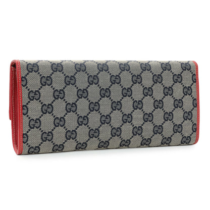 Exclusive Gucci Navy GG Canvas Bamboo Bar Clutch — Side View