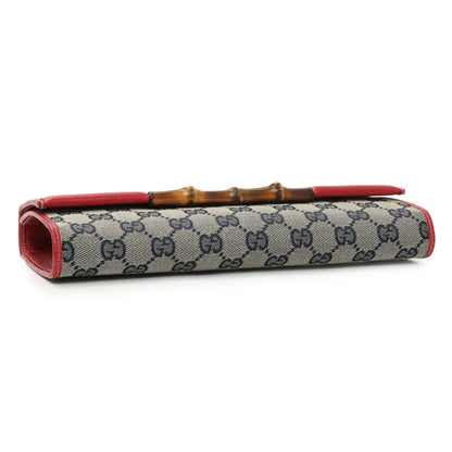 Exclusive Gucci Navy GG Canvas Bamboo Bar Clutch — Back View