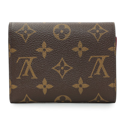 Exclusive Louis Vuitton Monogram Victorine Wallet — Side View