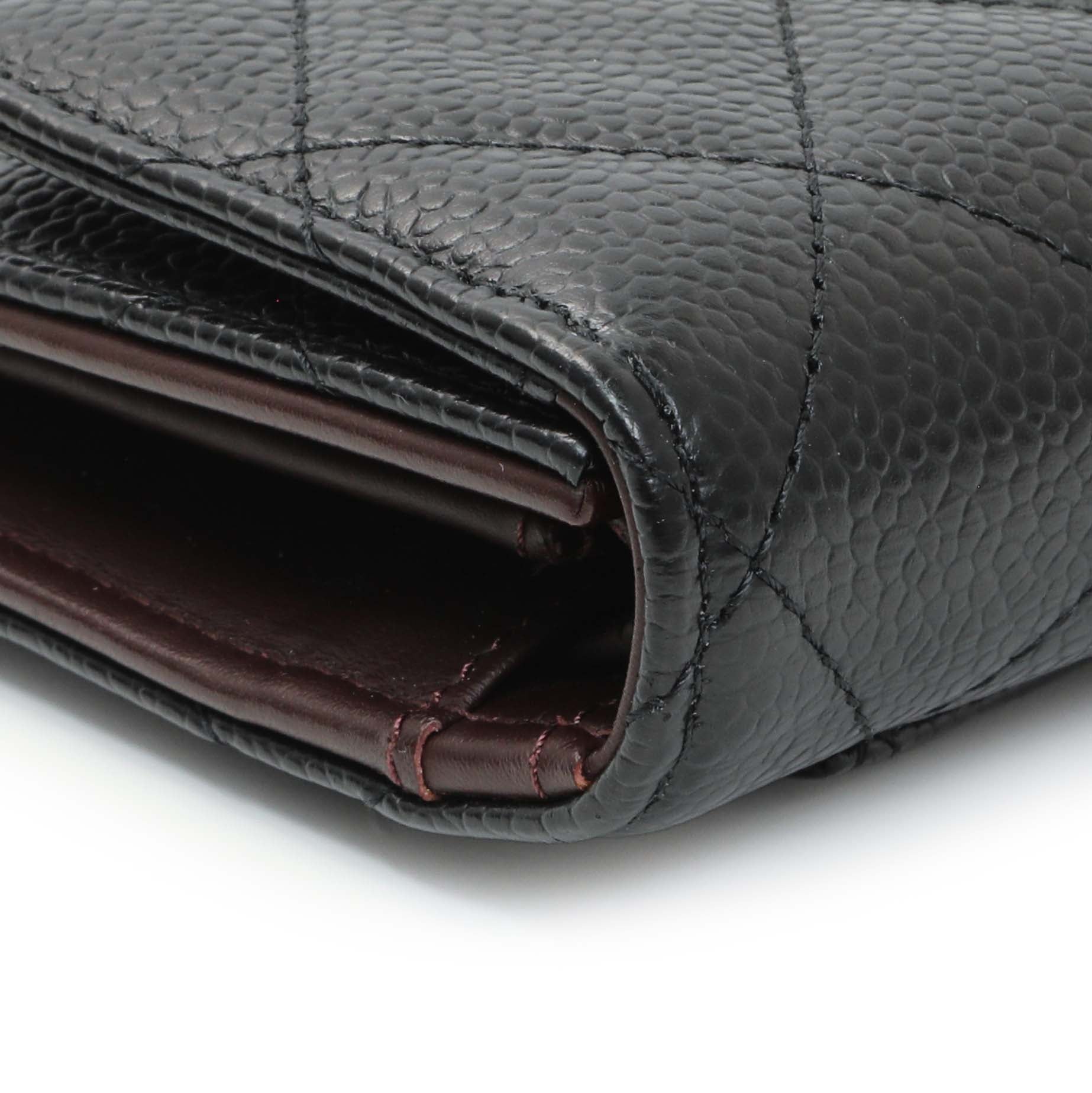 Exclusive Chanel Black Quilted Caviar Large Flap Wallet — Lifestyle View