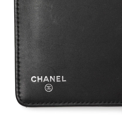 Exclusive Chanel Black Quilted Patent Yen Wallet — Lifestyle View