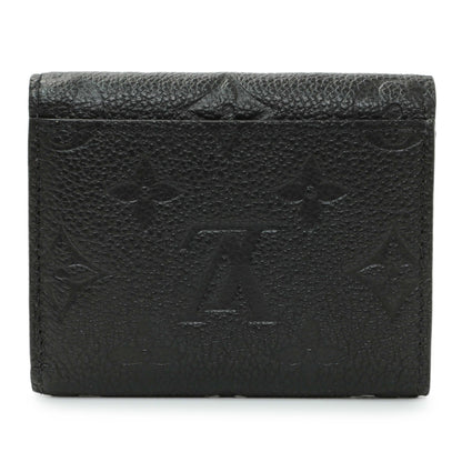 Exclusive Louis Vuitton Black Monogram Empreinte Leather Victorine Wallet — Side View