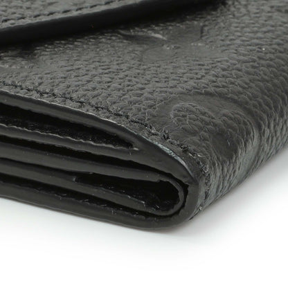 Exclusive Louis Vuitton Black Monogram Empreinte Leather Victorine Wallet — Top View