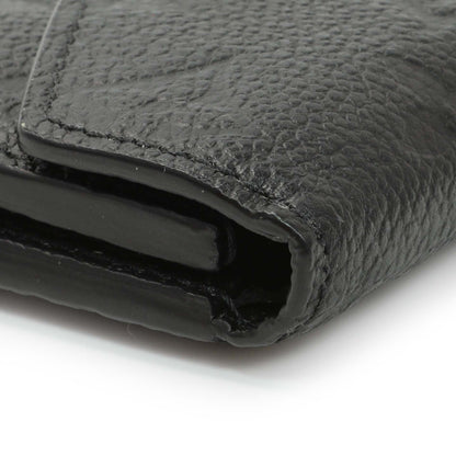 Exclusive Louis Vuitton Black Monogram Empreinte Leather Victorine Wallet — Lifestyle View