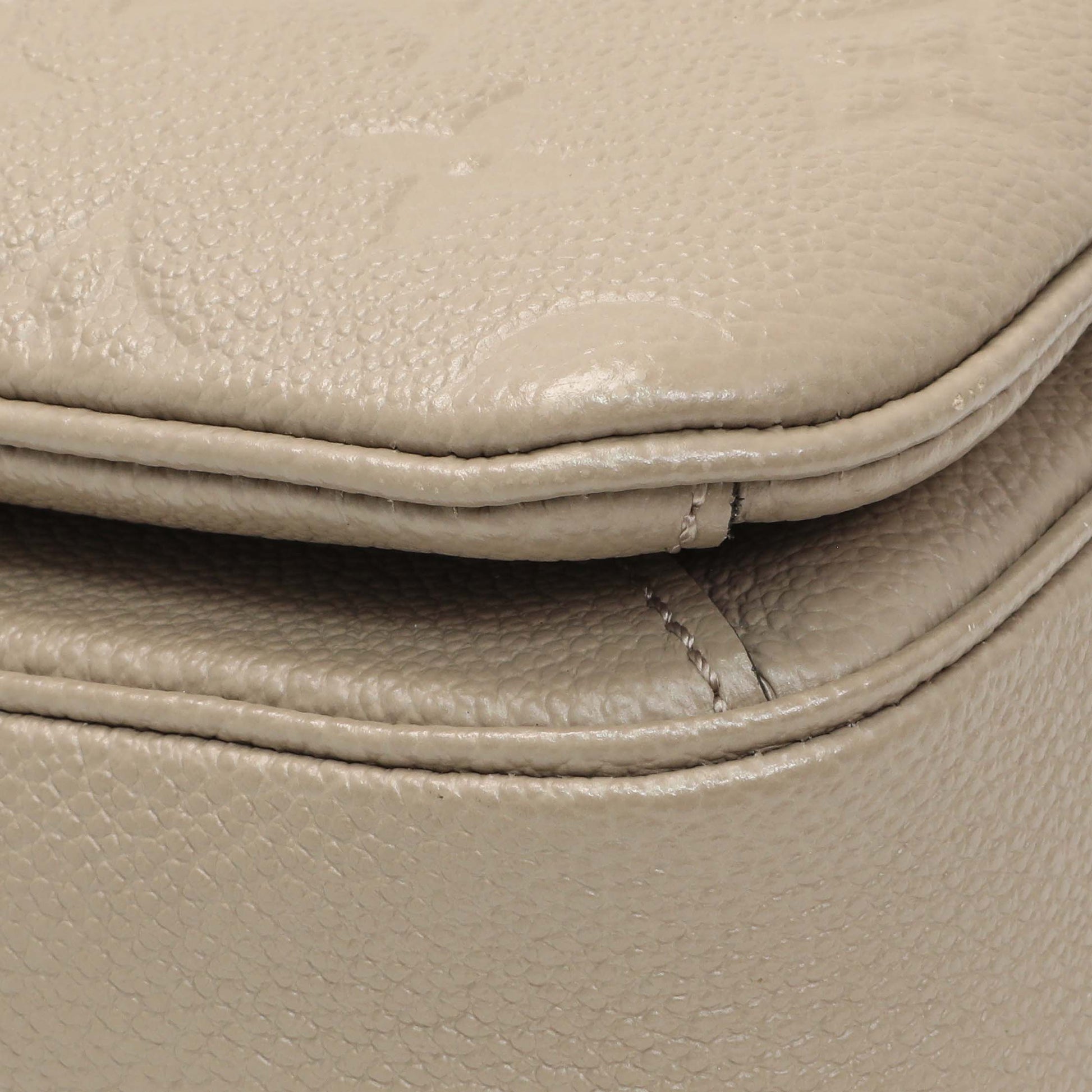 Exclusive Louis Vuitton Tourterelle Empreinte Pochette Metis — Top View