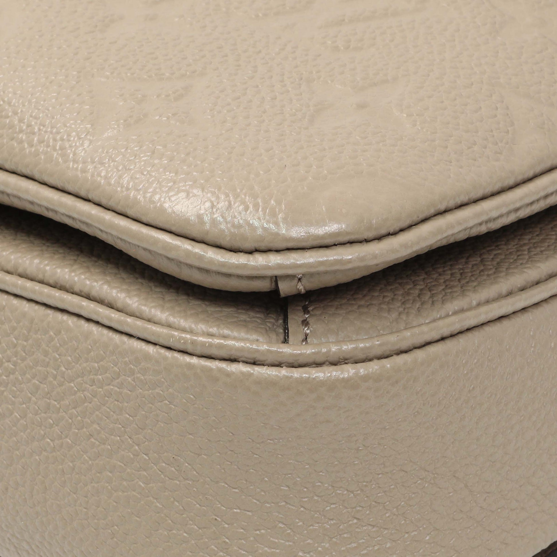 Exclusive Louis Vuitton Tourterelle Empreinte Pochette Metis — Detail View