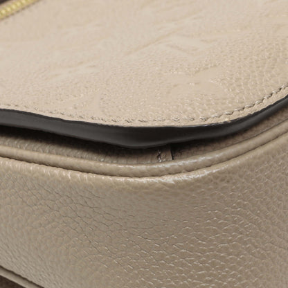 Exclusive Louis Vuitton Tourterelle Empreinte Pochette Metis — Lifestyle View