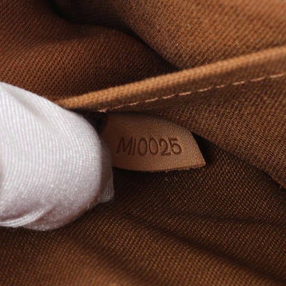 Exclusive Louis Vuitton Monogram Pochette Marelle PM — Lifestyle View