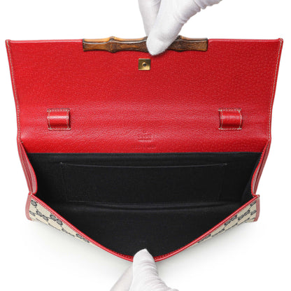 Exclusive Gucci Navy GG Canvas Bamboo Bar Clutch — Top View
