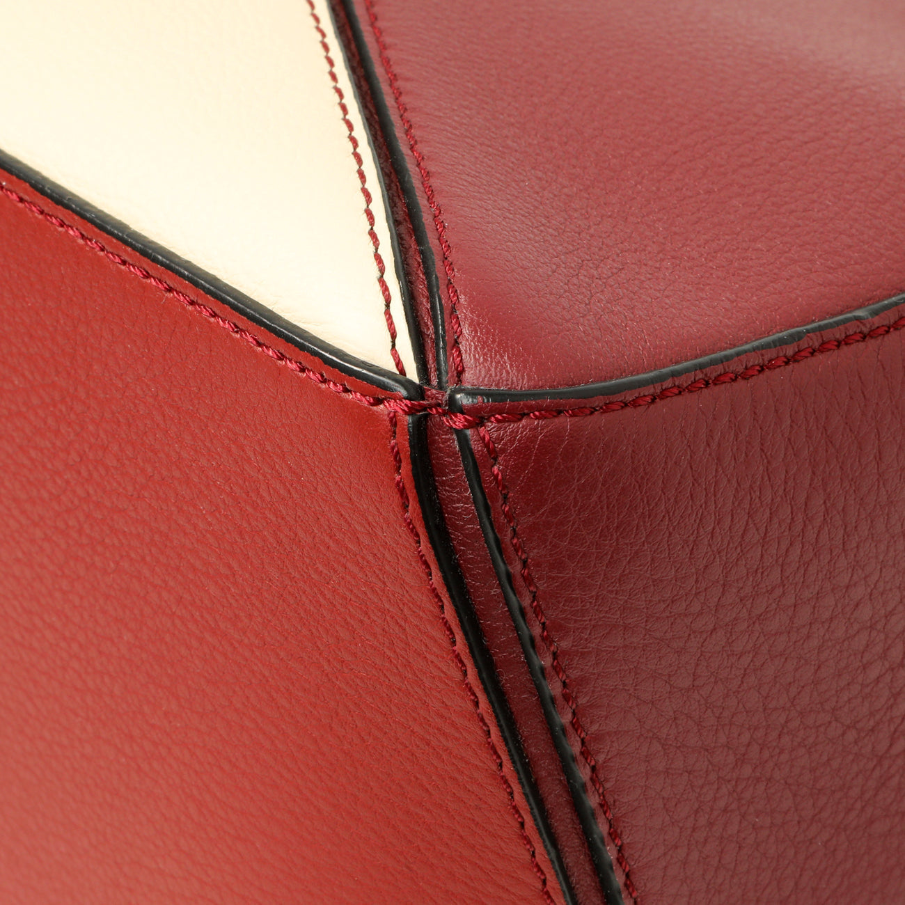 Exclusive Loewe Burgundy Calfskin Small Puzzle Bag — Detail View