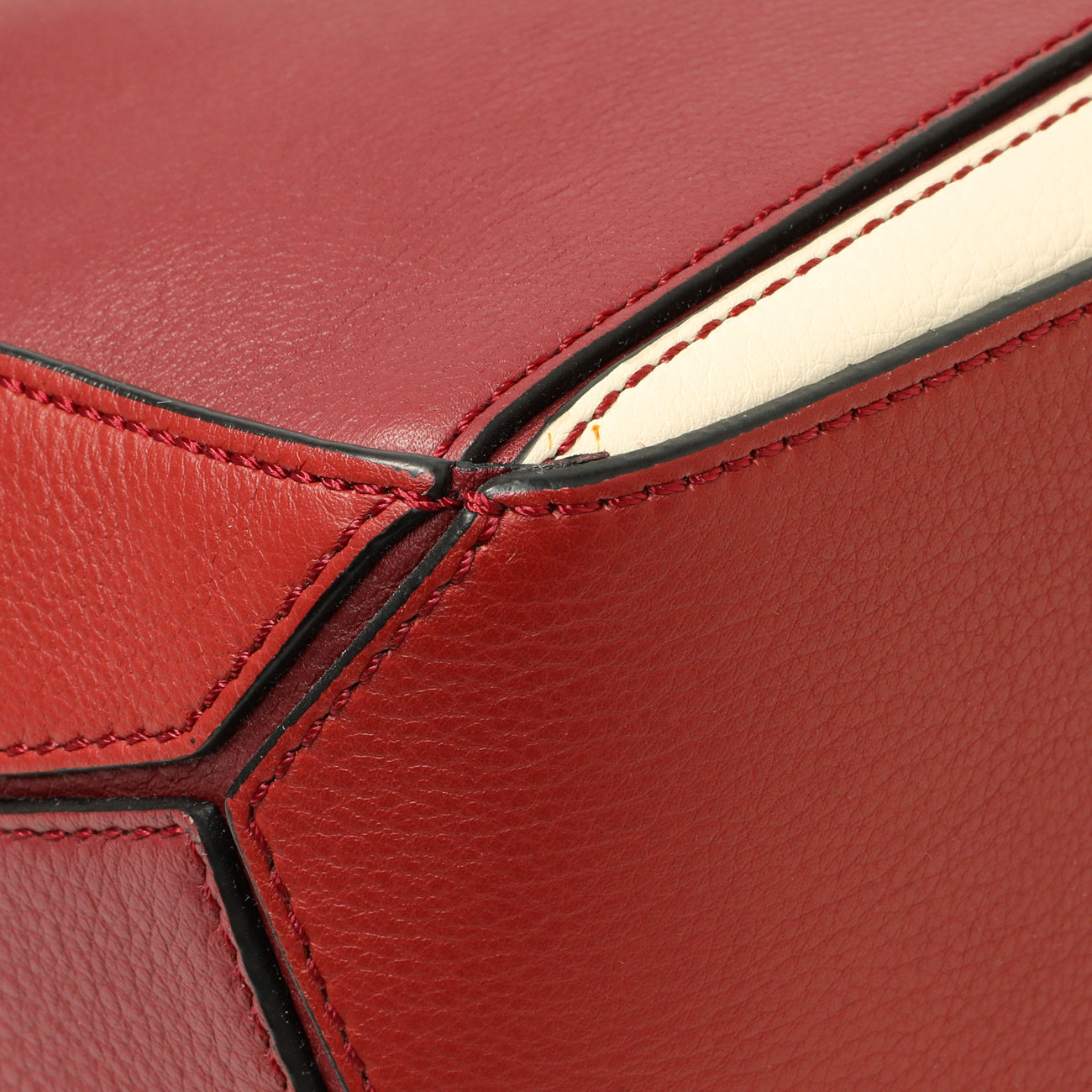 Exclusive Loewe Burgundy Calfskin Small Puzzle Bag — Lifestyle View