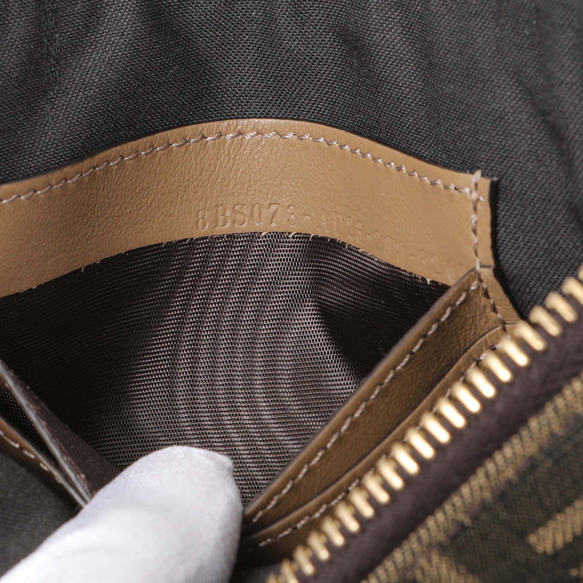 Exclusive Fendi Fabric Jacquard Vitello Grace FF 1974 Baguette Pouch — Lifestyle View
