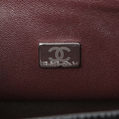 Exclusive Chanel Black Quilted Caviar Small Classic Double Flap — Lifestyle View