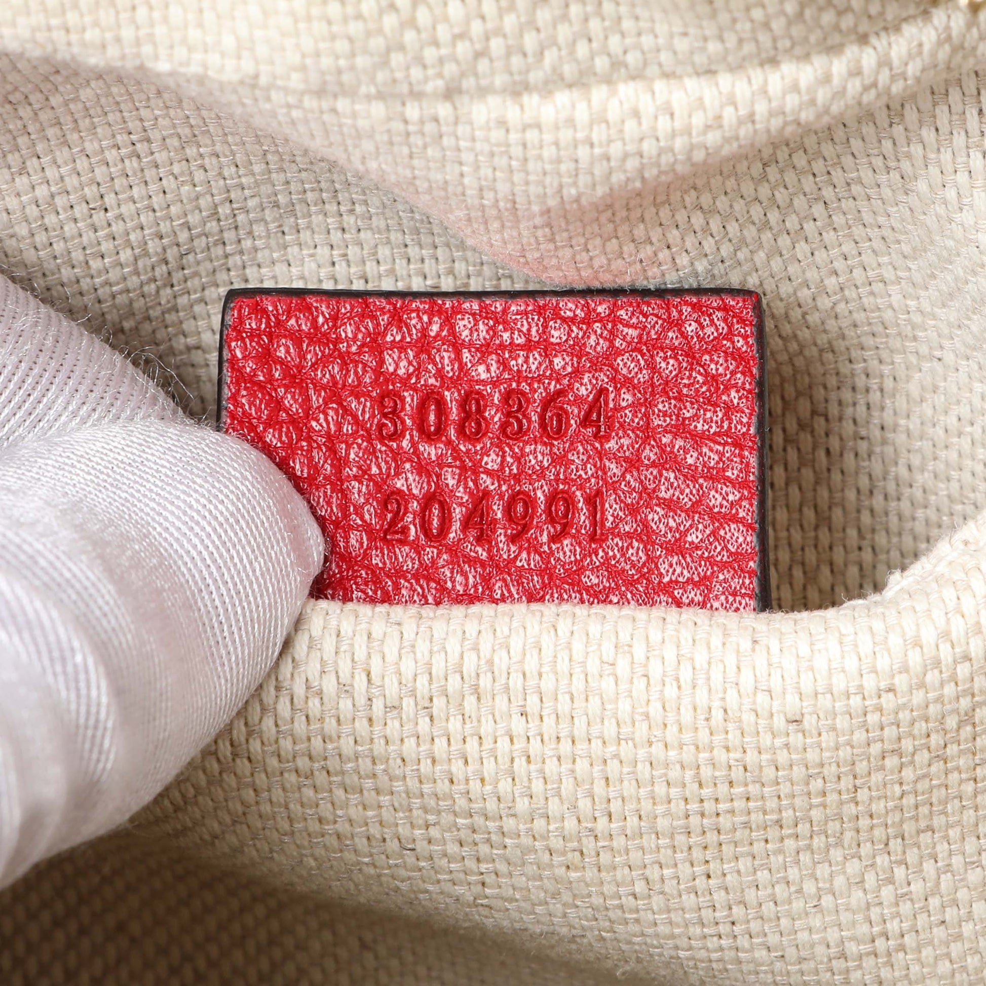 Exclusive Gucci Red Pebbled Calfskin Small Soho Disco Bag — Lifestyle View