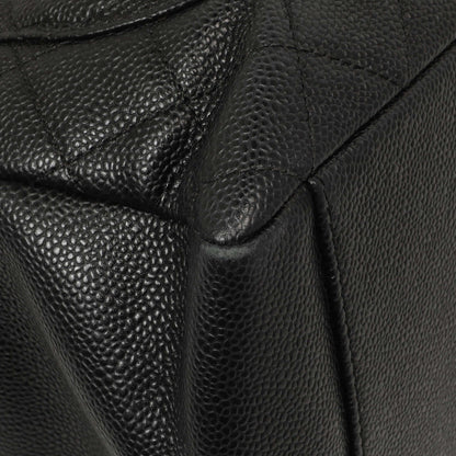 Exclusive Chanel Black Quilted Caviar Grand Shopping Tote GST — Lifestyle View