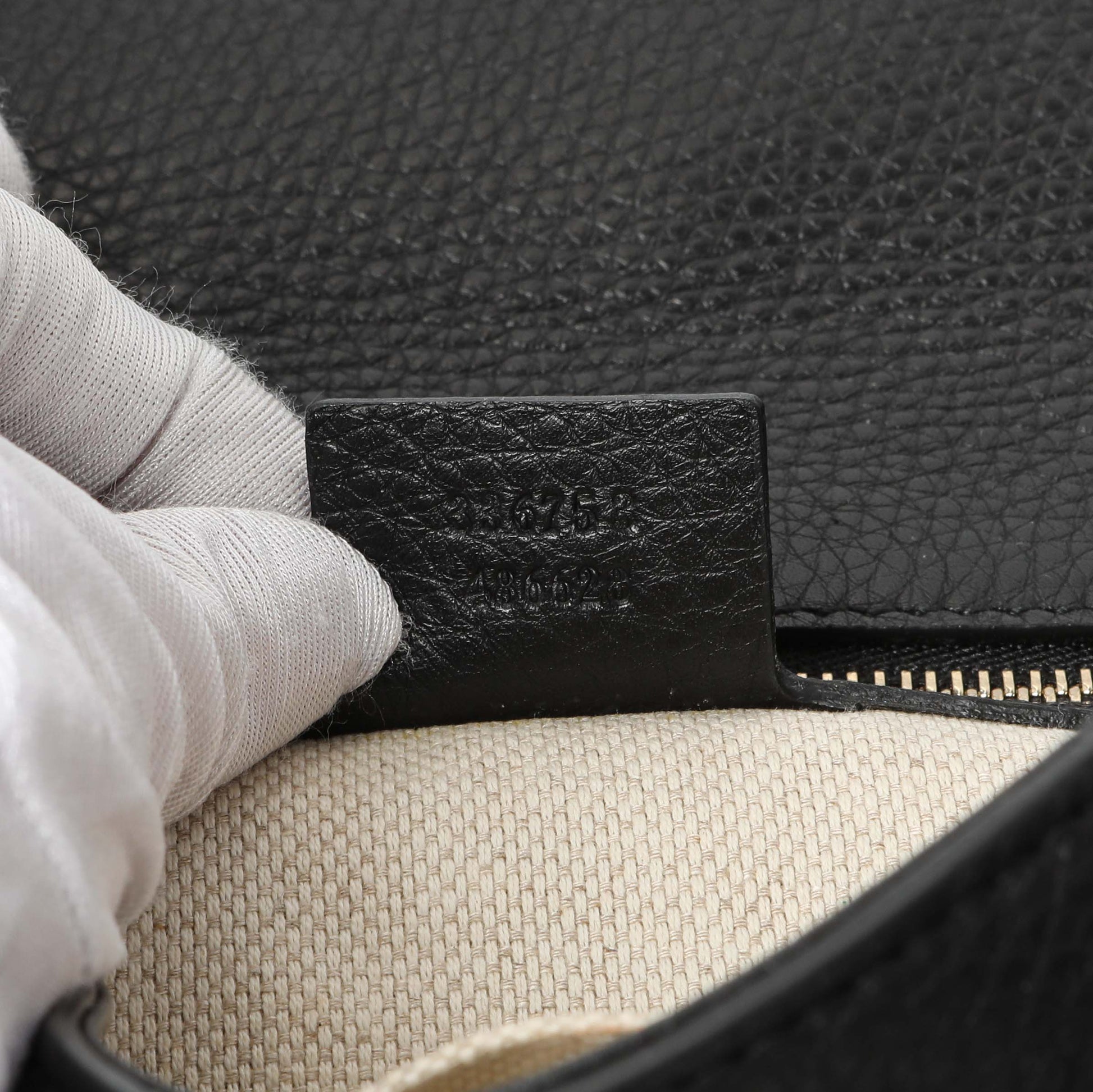 Exclusive Gucci Black Leather Medium GG Soho Tassel Clutch — Lifestyle View