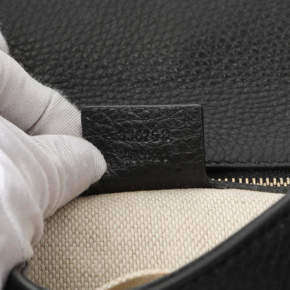 Exclusive Gucci Black Leather Medium GG Soho Tassel Clutch — Lifestyle View