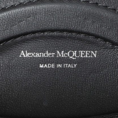 Exclusive Alexander McQueen Black Calfskin Mini Curve Bucket Bag — Lifestyle View