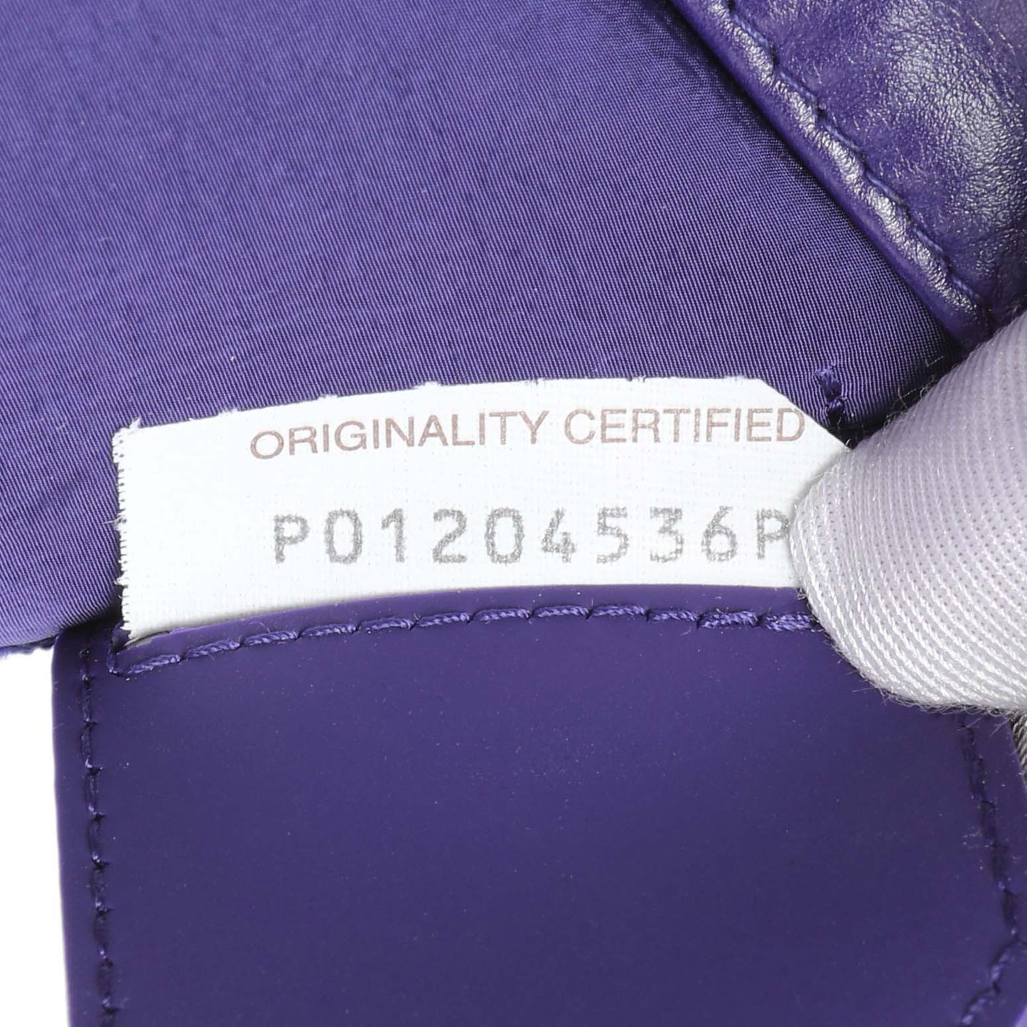 Exclusive Bottega Veneta Purple Paper Calfskin Maxi Intreccio Extra Mini Cassette Crossbody Bag — Lifestyle View