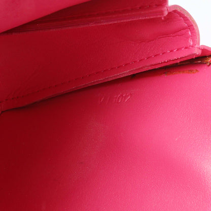 Exclusive Louis Vuitton Fuchsia Monogram Vernis Lexington Pochette — Lifestyle View