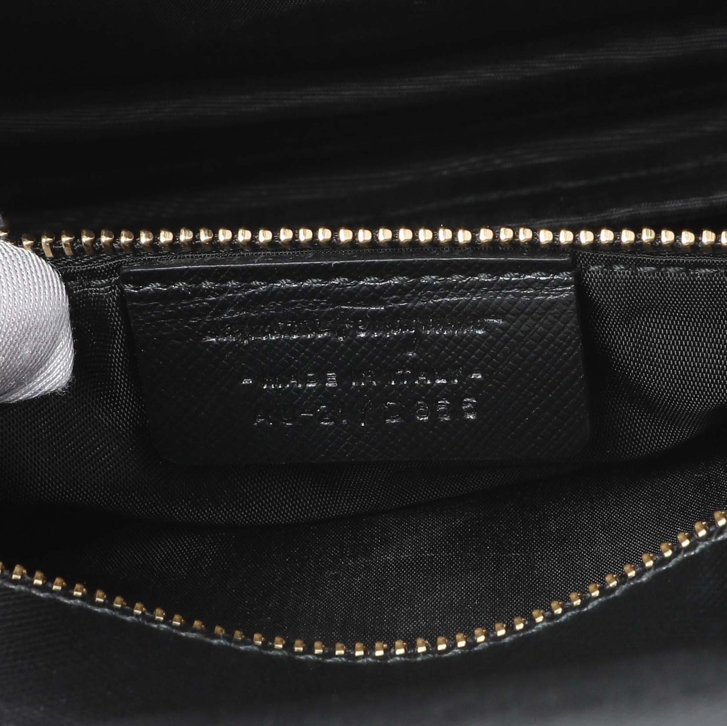 Exclusive Salvatore Ferragamo Black Calfskin Vara Bow Chain Flap Crossbody — Lifestyle View