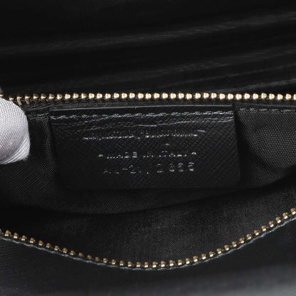 Exclusive Salvatore Ferragamo Black Calfskin Vara Bow Chain Flap Crossbody — Lifestyle View