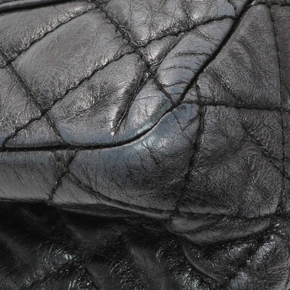 Exclusive Chanel Charcoal Grey Metallic Aged Calfskin 2.55 Reissue Double Flap 227 — Lifestyle View