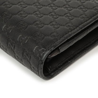 Exclusive Gucci Black Microguccissima Bow Continental Wallet — Lifestyle View
