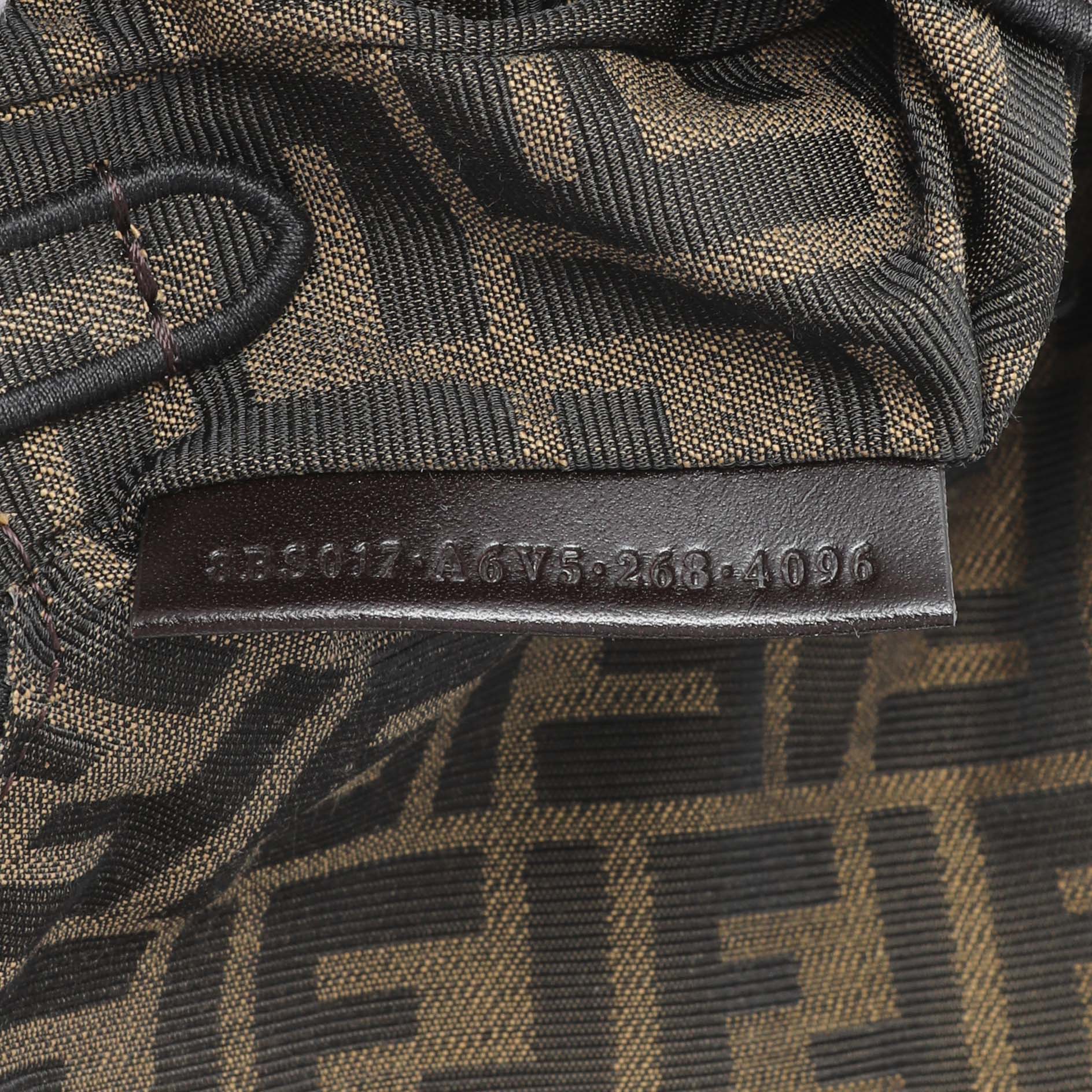 Exclusive Fendi Fabric Jacquard FF 1974 Mini Baguette — Lifestyle View