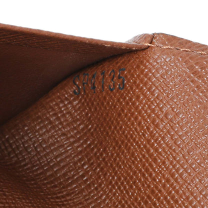 Exclusive Louis Vuitton Monogram Passport Cover — Lifestyle View