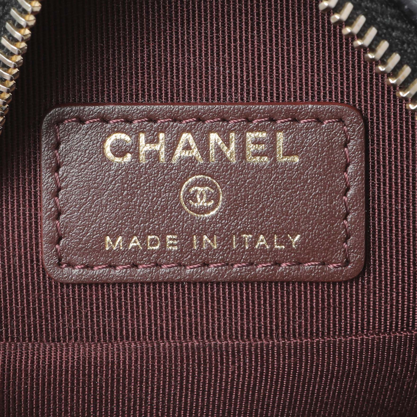 Exclusive Chanel Black Quilted Caviar Round Clutch With Chain — Lifestyle View