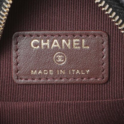 Exclusive Chanel Black Quilted Caviar Round Clutch With Chain — Lifestyle View