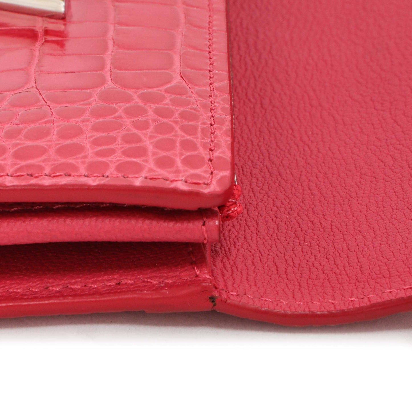 Exclusive Louis Vuitton Pink Alligator Twist Wallet — Lifestyle View