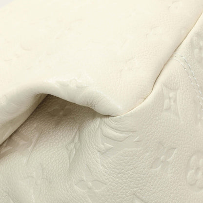 Exclusive Louis Vuitton White Empreinte Artsy MM — Lifestyle View