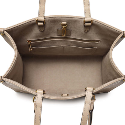 Exclusive Louis Vuitton Empreinte Monogram Giant Onthego MM — Top View