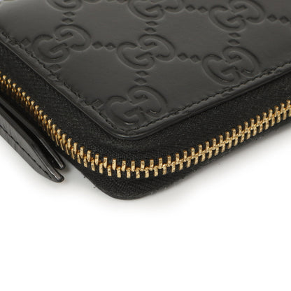 Exclusive Gucci Black Guccissima Zip Around Card Case — Lifestyle View
