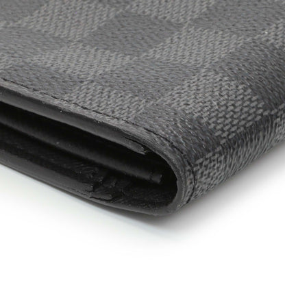 Exclusive Louis Vuitton Damier Graphite Brazza Wallet — Lifestyle View