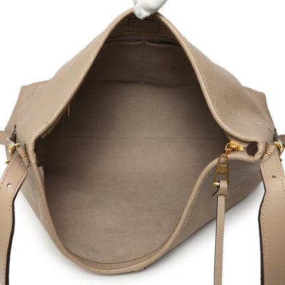 Exclusive Louis Vuitton Tourterelle Empreinte Monogram Giant Carryall MM — Alternate View 9