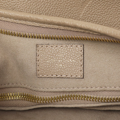 Exclusive Louis Vuitton Tourterelle Empreinte Monogram Giant Carryall MM — Alternate View 10