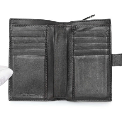 Exclusive Bottega Veneta Black Intrecciato Bi-Fold Compact Wallet — Lifestyle View