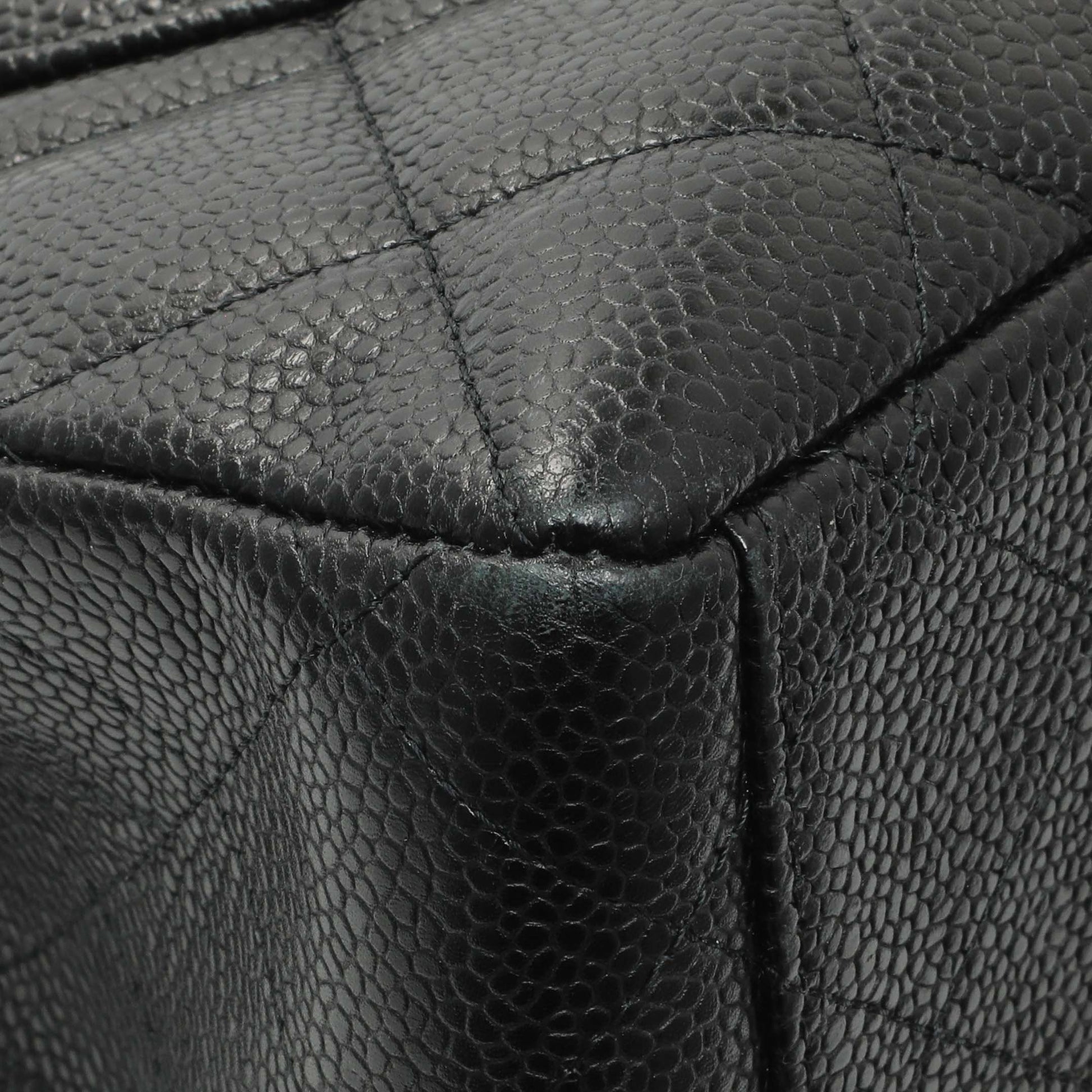 Exclusive Chanel Black Quilted Caviar Maxi Single Flap — Lifestyle View