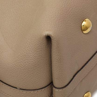 Exclusive Louis Vuitton Tourterelle Empreinte Monogram Giant Carryall MM — Detail View