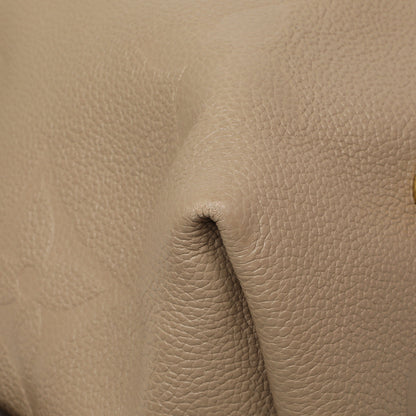 Exclusive Louis Vuitton Tourterelle Empreinte Monogram Giant Carryall MM — Alternate View 7