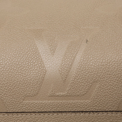 Exclusive Louis Vuitton Tourterelle Empreinte Monogram Giant Carryall MM — Alternate View 14
