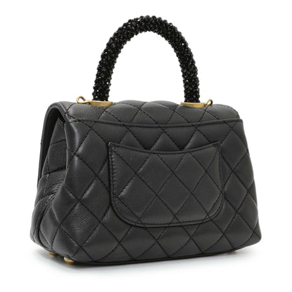 Exclusive Chanel Black Quilted Goatskin Extra Mini Coco Handle Flap — Side View