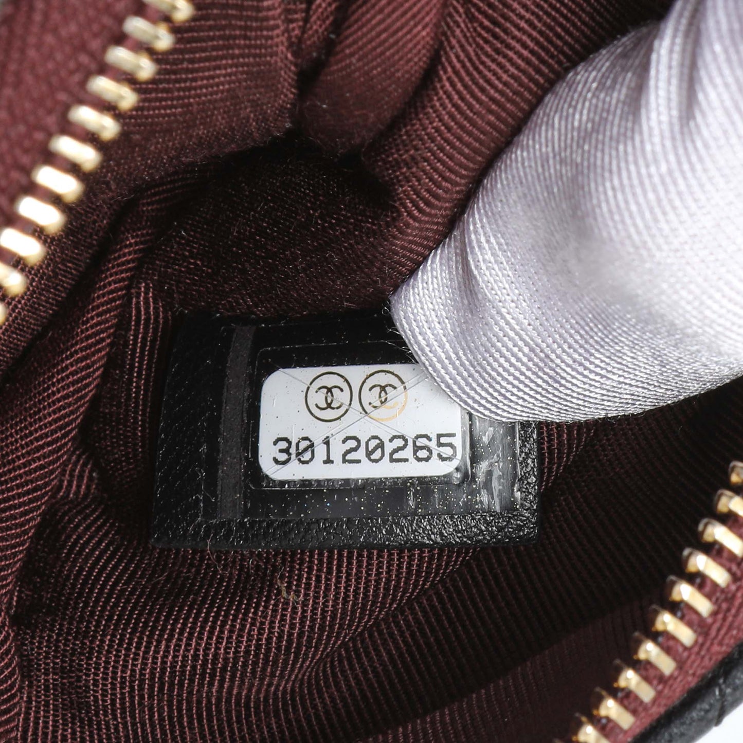 Exclusive Chanel Black Lambskin Quilted Small Cosmetic Case — Lifestyle View