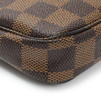 Exclusive Louis Vuitton Damier Ebene Trunks and Bags Mini Pochette Accessories — Lifestyle View